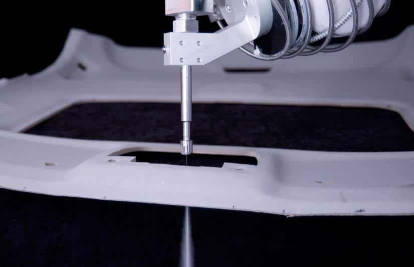 Automated waterjet cutting for automotive soft trim components